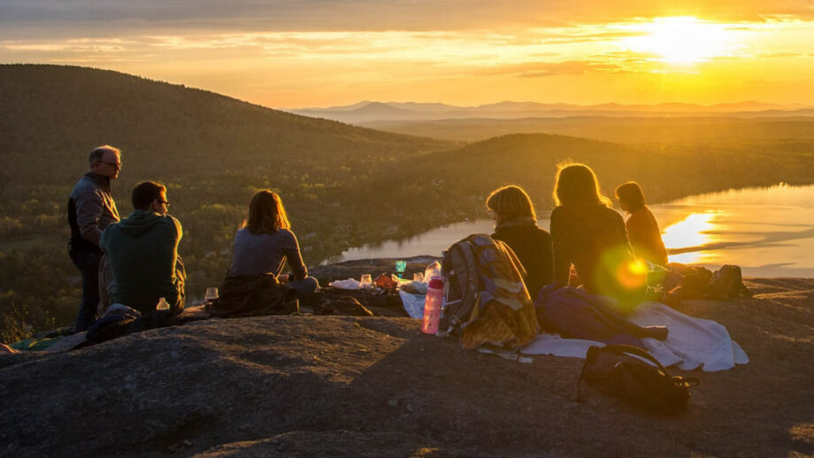 Group camping with sunset feature