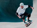 skateboarder with skateboarding protective gear helmet pads
